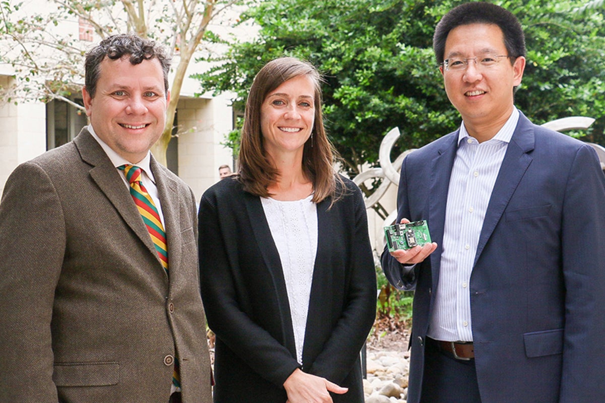 UCF researchers, who are part of a team studying air quality in Downtown Orlando, pose together.