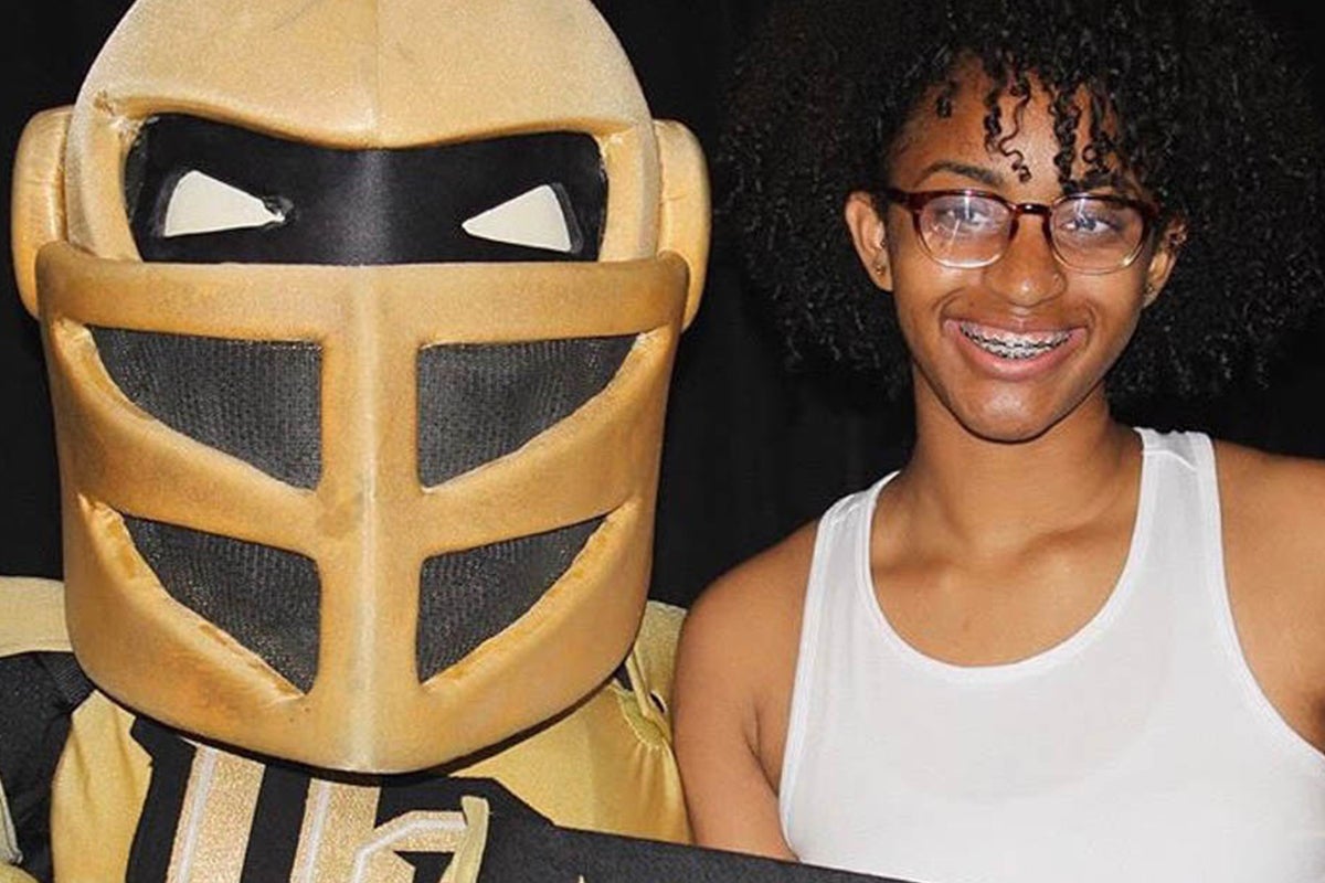 Knightro with Amiyah Murphy-Allison.