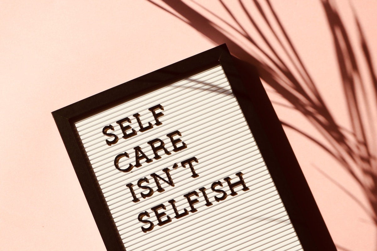 sign: self care isn't selfish