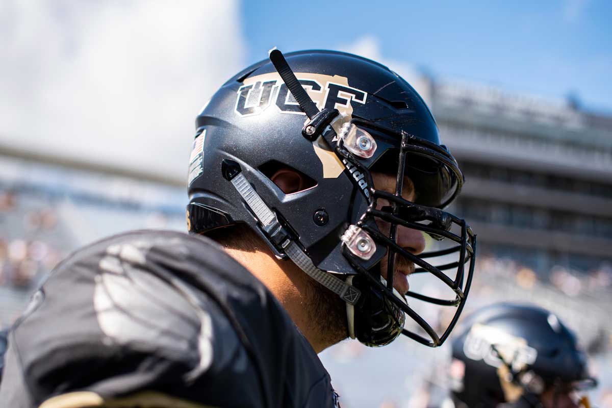 black football helmet with gold outline of Florida