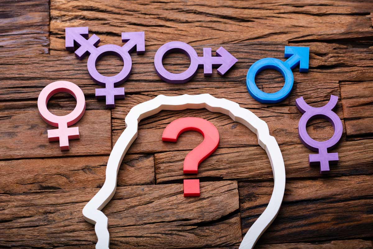 gender symbols surround outline of man