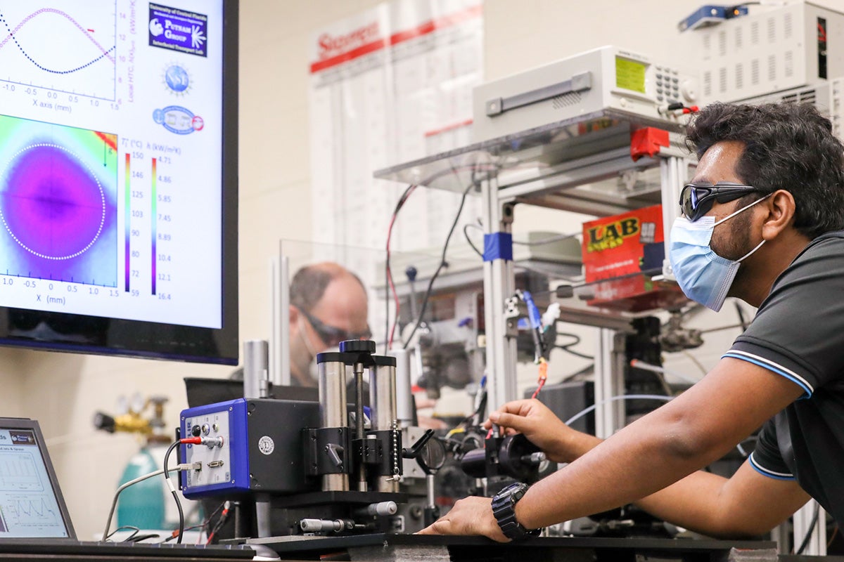UCF researchers working on a cooling system for electronics