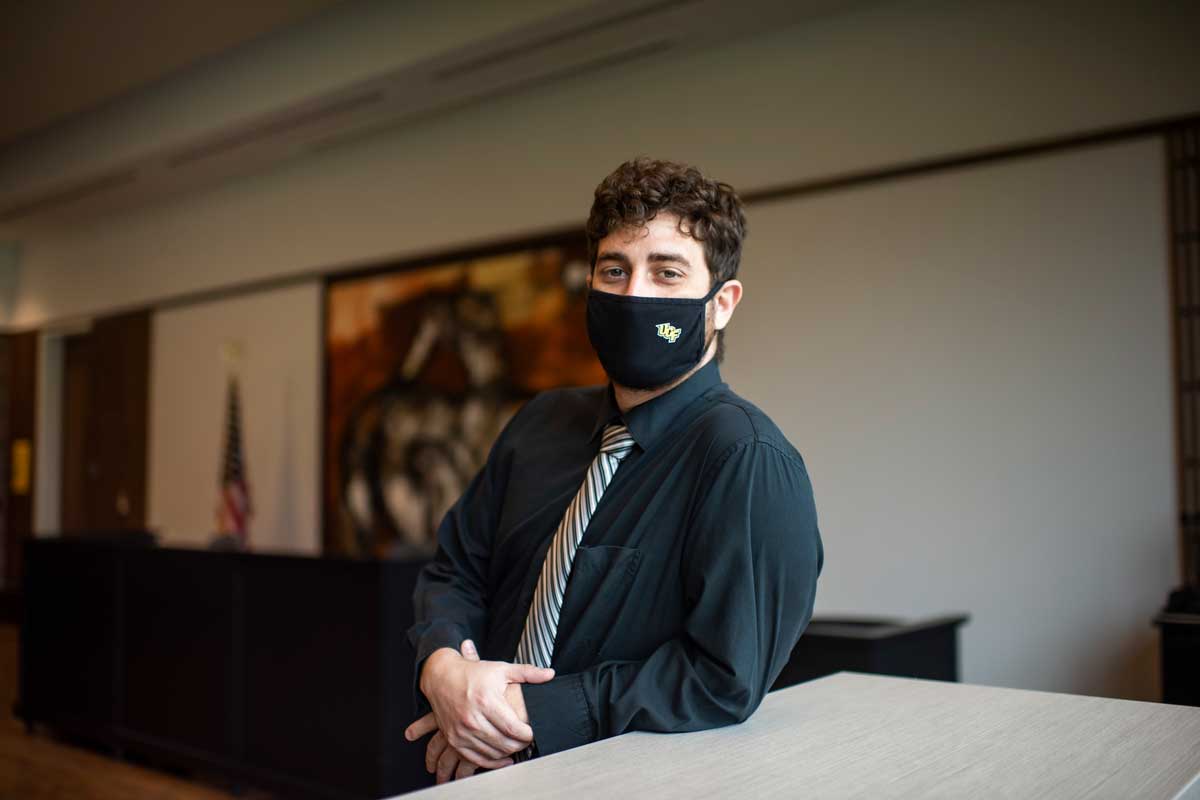 Anthony Daniels stands in mock courtroom