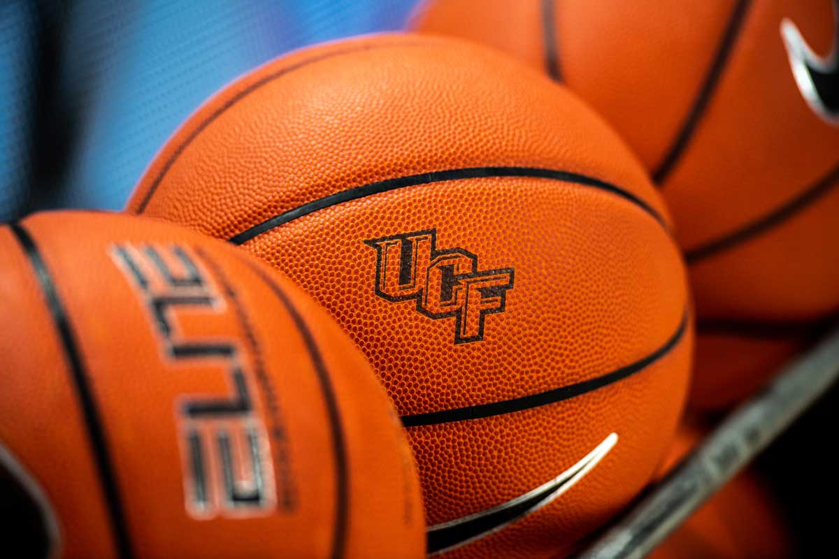 closeup of basketballs on ball rack
