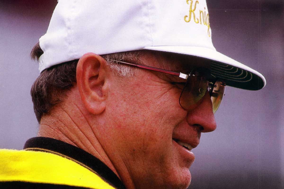 closeup of Gene McDowell in white knights hat