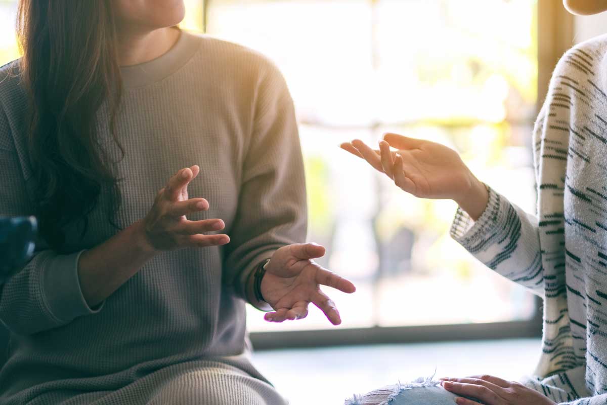 Close up image of women enjoyed talking and drinking coffee together