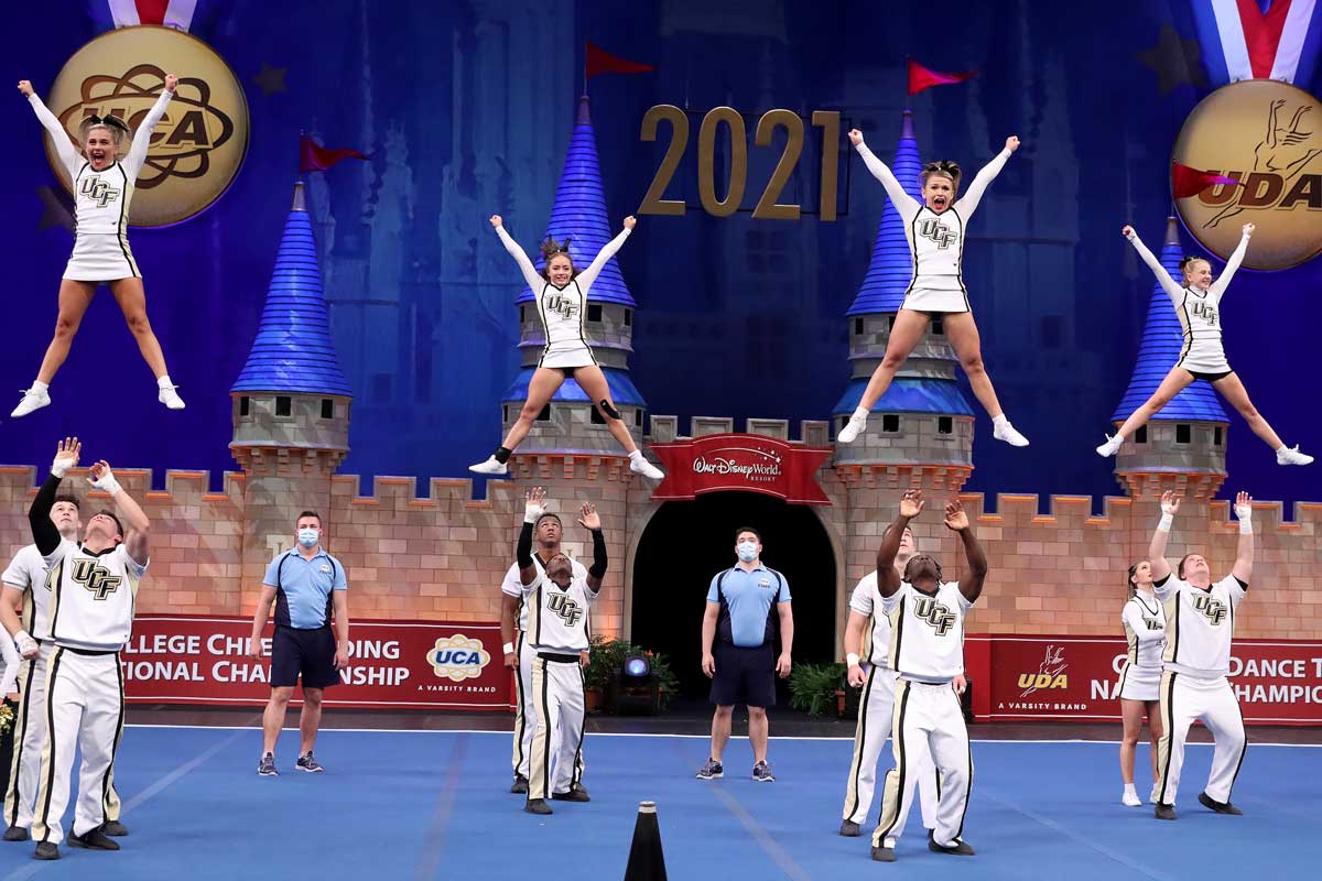 UCF cheerleaders perform on stage
