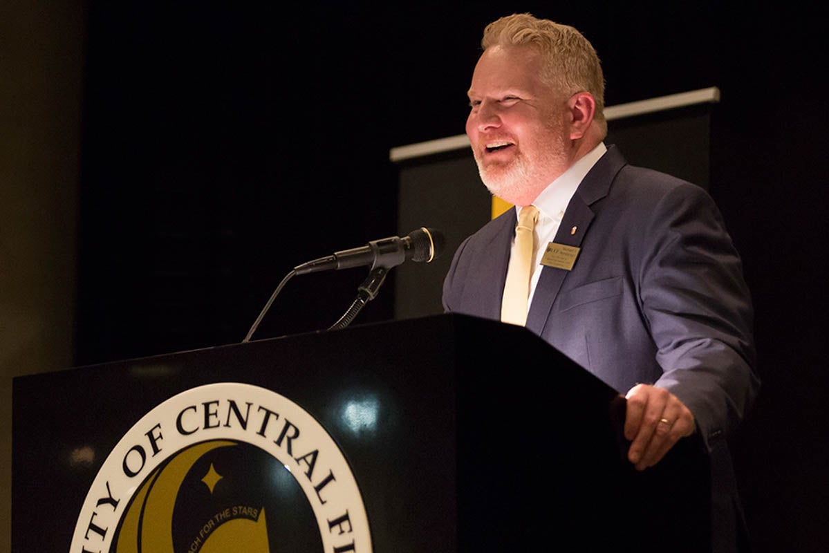 UCF Foundation CEO Michael Morsberger speaks at an event