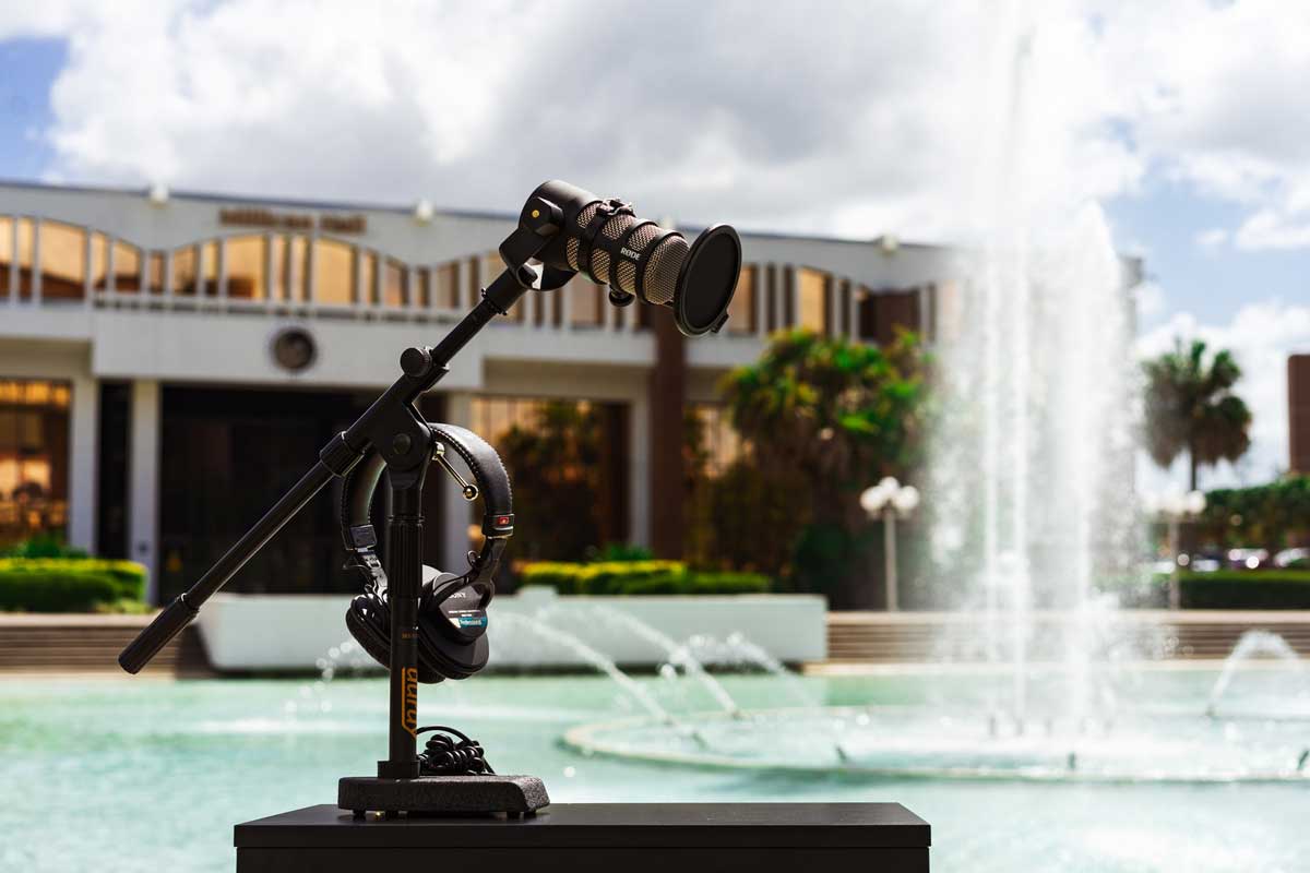 microphone on stand in front of Reflecting Pond
