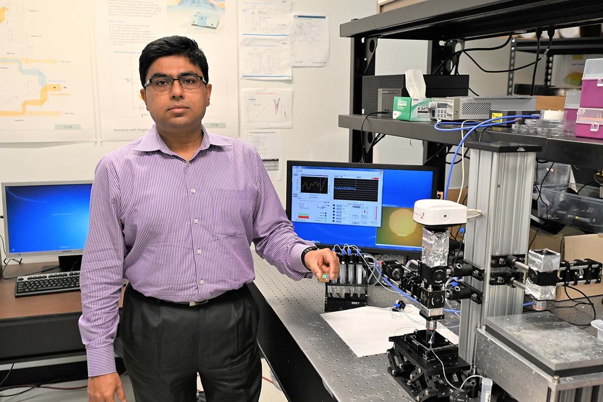 Debashis Chanda shows virus detector technology
