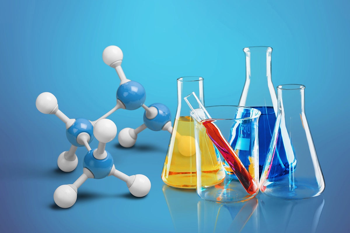 photo illustration of molecules and chemicals in beakers