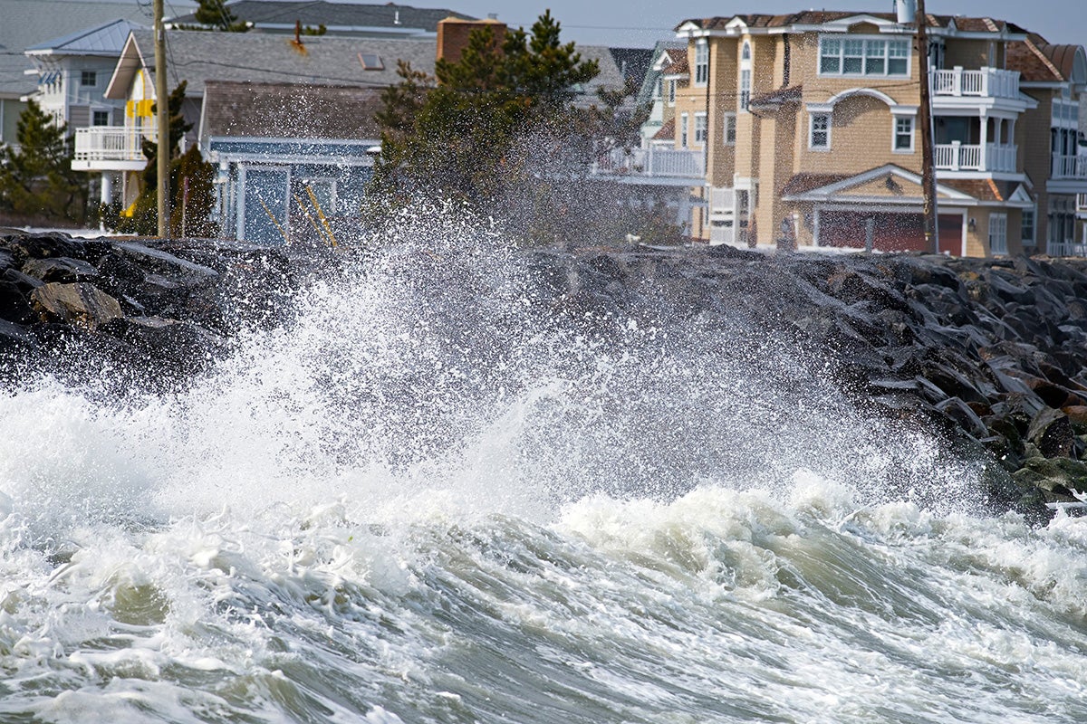 waves crashing against a sea wall
