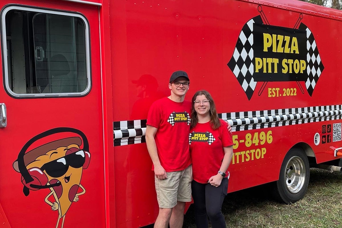 UCF Rosen College graduates Dylan Pittman and Emily Davis launch Pizza Pitt Stop food truck in Florida