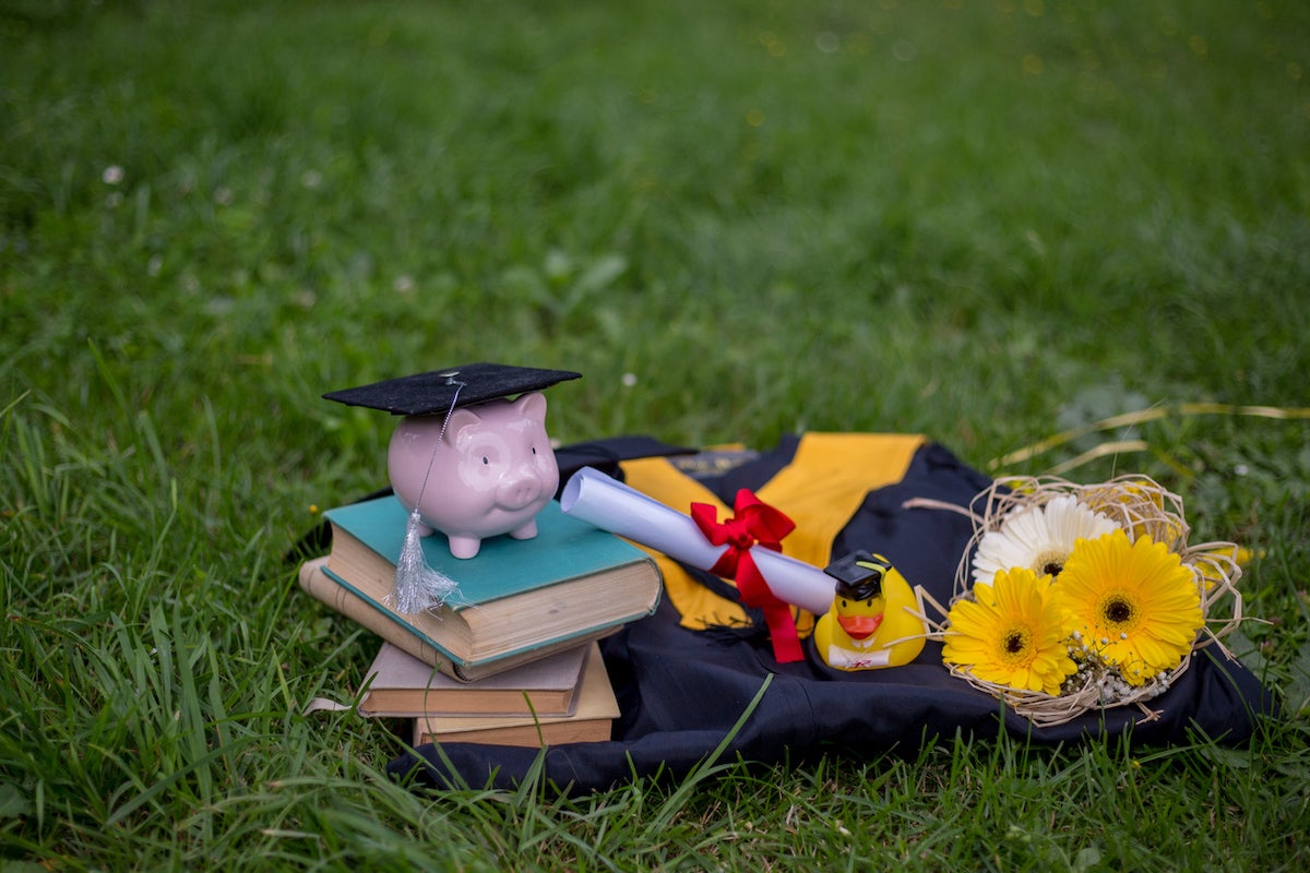 Tassel hanging from the cap with a rolled up diploma