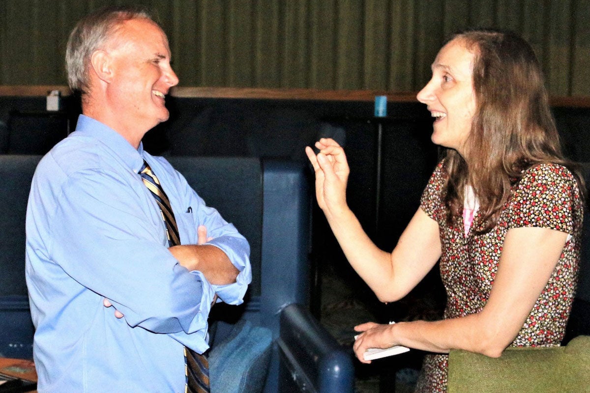 Martin Klapheke with filmmaker and animator Signe Baumane speaking