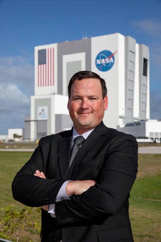 Wes Mosedale in front of the Kennedy Space Center Launch Complex