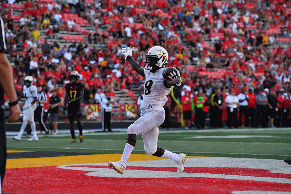 A football player makes a touchdown