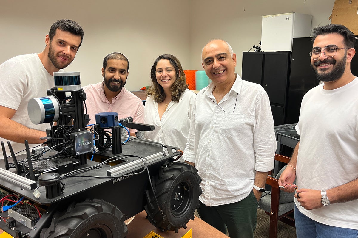 Shown are some members of the UCF CITRS lab with the autonomous Husky robot “Cypertor – the Cyber Inspector” (left to right): Furkan Lüleci, Inad Alqurashi, Mahta Zakaria, Dr. Necati Catbas, Abdulrrahman Algadi.
