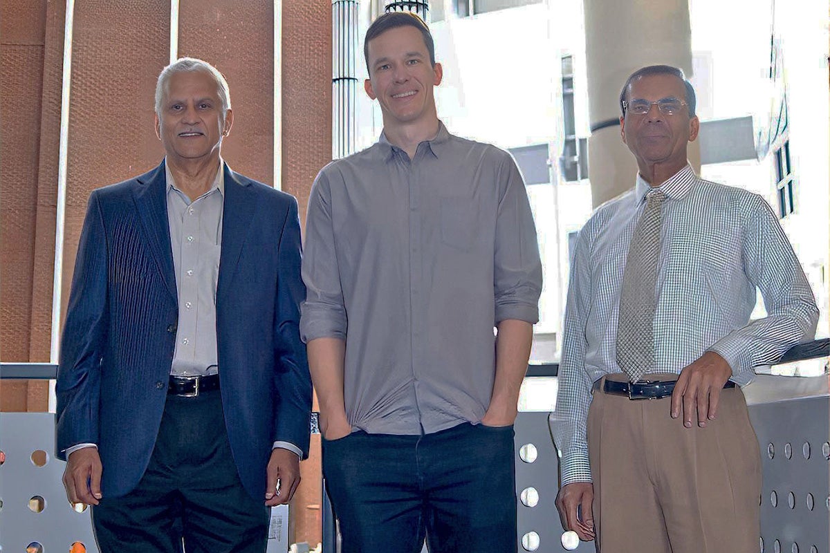 UCF researchers leading the project, from left to right, are Ranganathan Kumar, a professor of mechanical and aerospace engineering and the associate dean of research and administration for the College of Engineering and Computer Science; Kristopher Davis, the project’s principal investigator and an associate professor of materials science and engineering; and Aravinda Kar, a professor in CREOL, the College of Optics and Photonics.