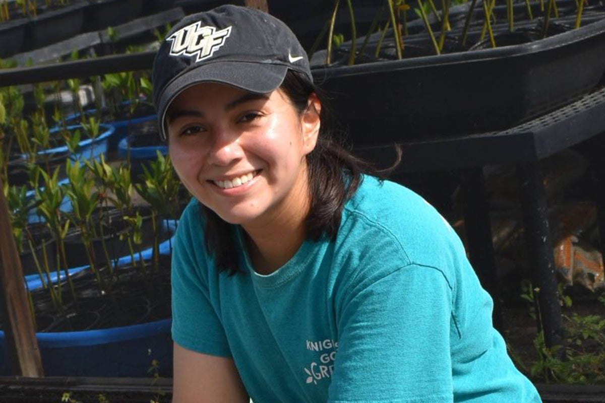 Luciana Banquero, a UCF marine science grad student smiles for a photo.
