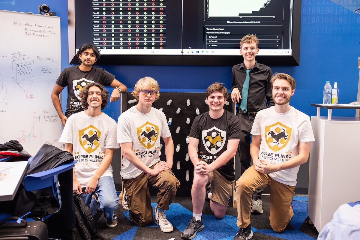 A group of students posting for a photo