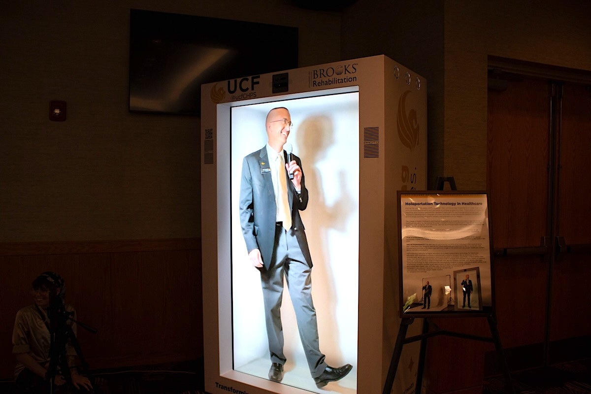 Matthew Theirot displayed as a hologram