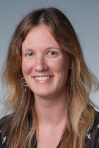 Portrait of white woman with long dirty-blonde hair