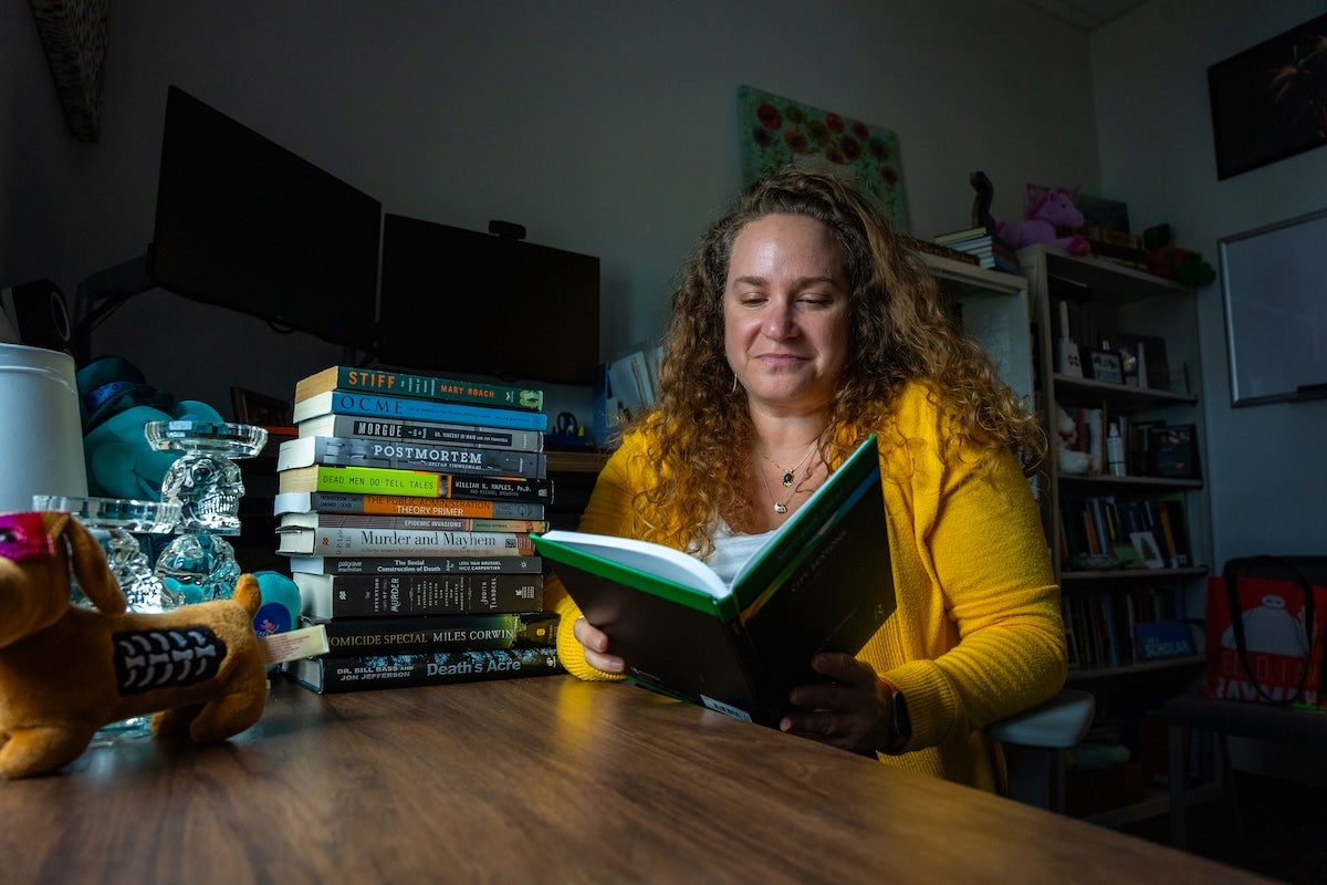 Staci Zavattaro reading a book