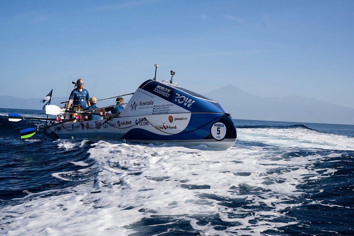 Team Rowtalia boat on ocean on sunny day
