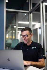 A student working on a laptop