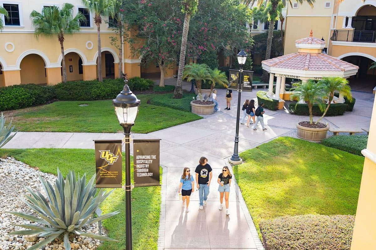 Students walking on the Rosen College campus