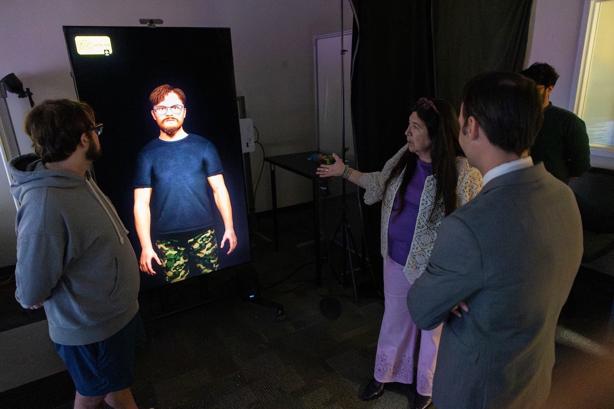 A person presenting a digital twin