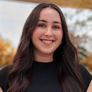 Portrait of brunette woman in black top