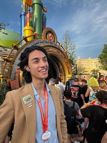Christian Spencer in front of the Super Nintendo World portal at Universal Epic Universe.