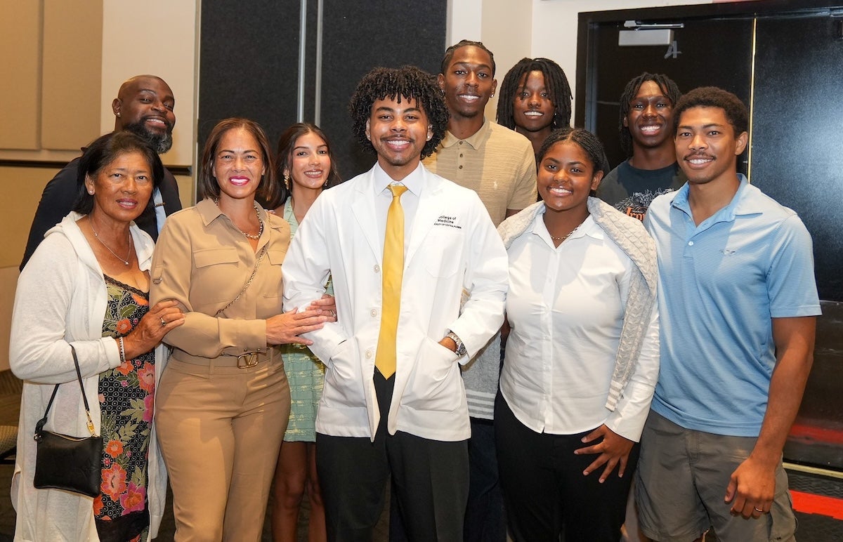 Nelson Jones with his family, including both parents who are nurses and inspired him to go into medicine.