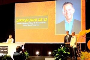 A presentation of an award on stage