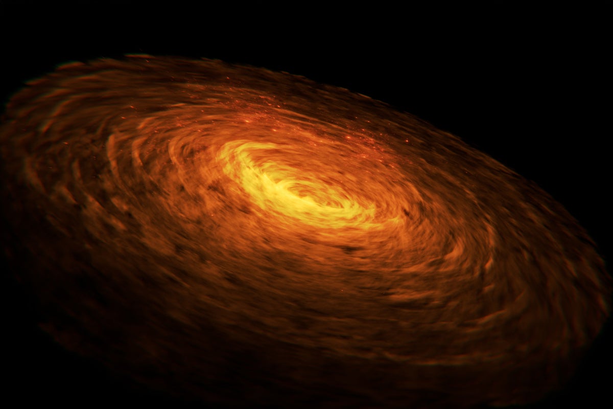 A swirling cloud of super heated gas and dust orbits the nucleus of a nascent star.