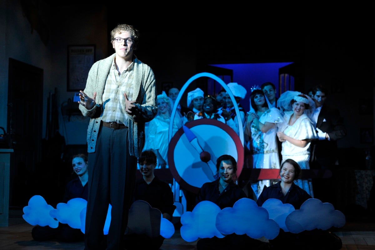Alex Bair on stage during a theatre performance
