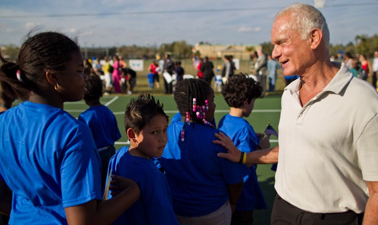 Harris Rosen with a group of children