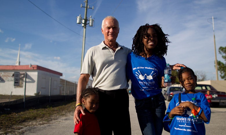 Harris Rosen with a group of children