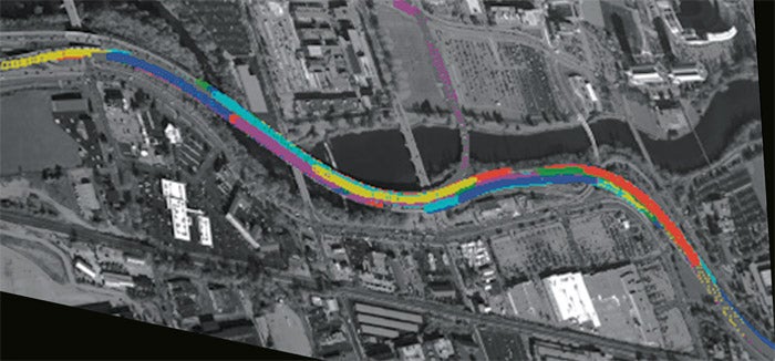 This wide-area surveillance video demonstrates vehicle tracking in a high-density traffic scene.