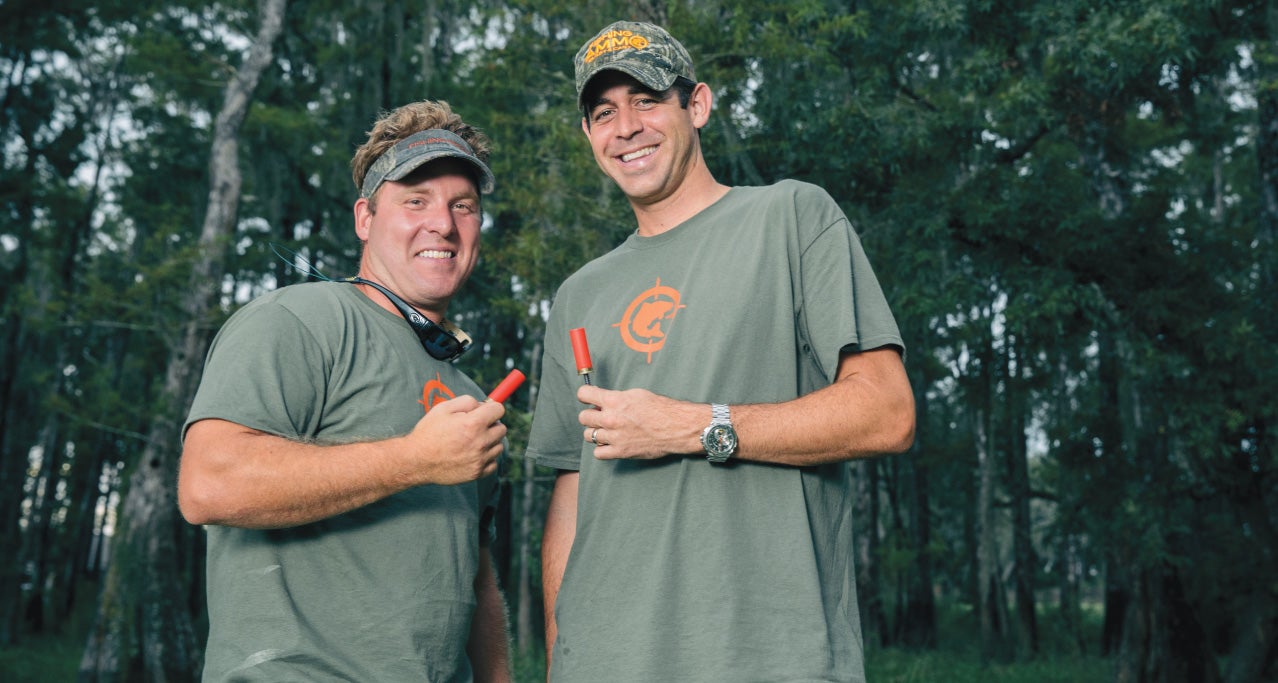 Image of Dusty Holloway and Jeff Stafford holding their fishing ammo