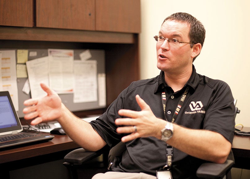 U.S. Department of Veterans Affairs psychologist Brian Batien counsels student veterans at UCF.