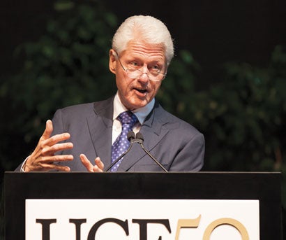 Former president Bill Clinton speaking at UCF commencement