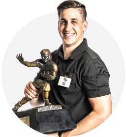 headshot of eric desalvo holding trophy