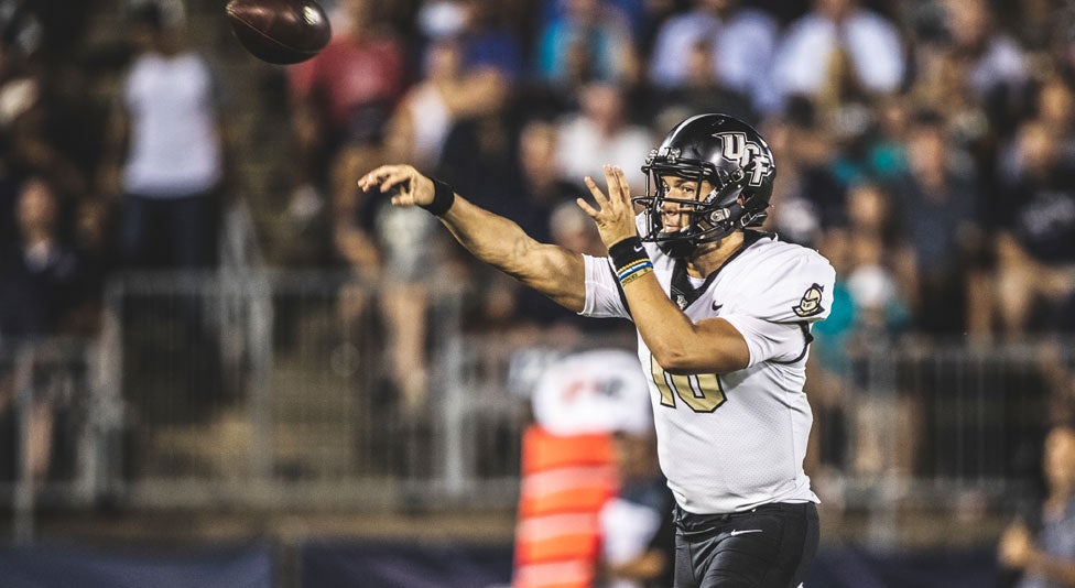 ucf quarterback McKenzie Milton throws the football during a game