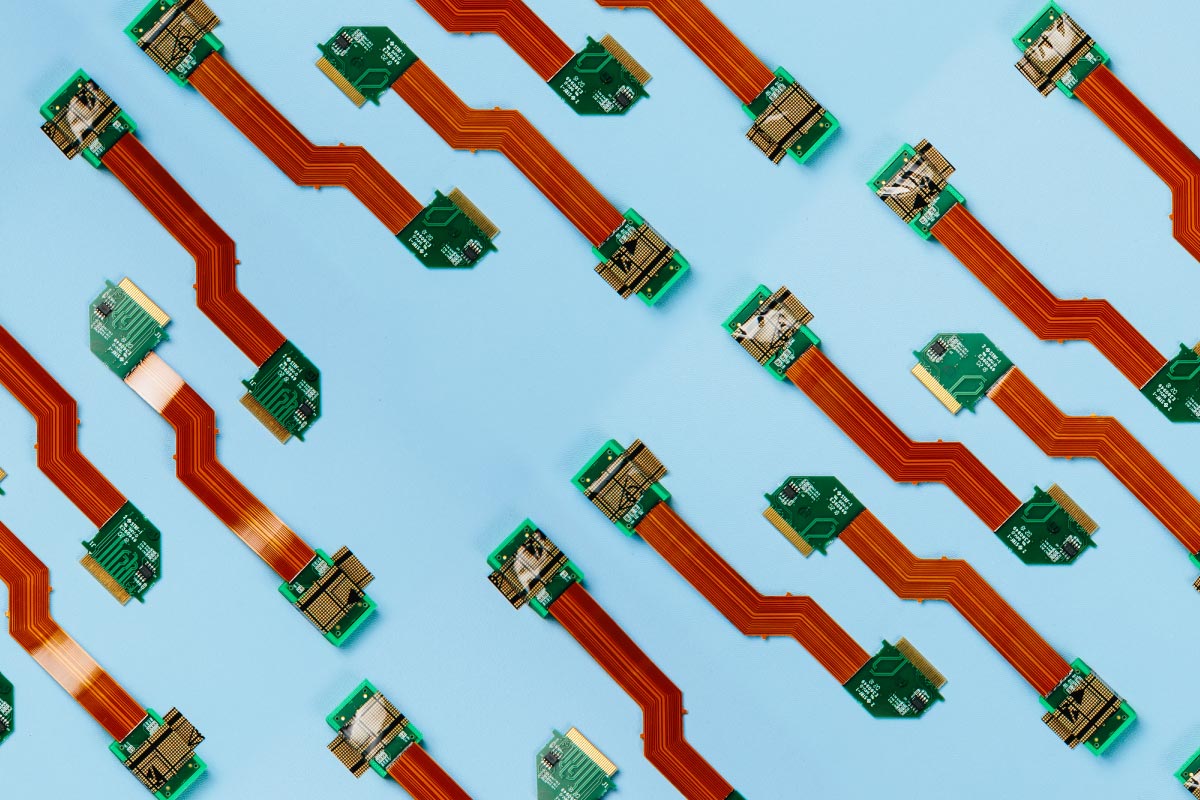 Lidar sensors which look like two electronic chips connected by a red strip.