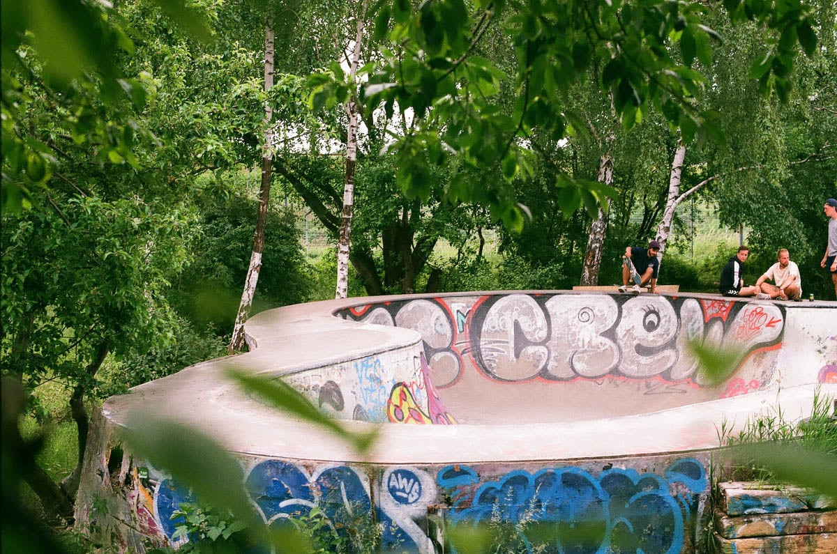 A graffiti concrete BMX bowl.