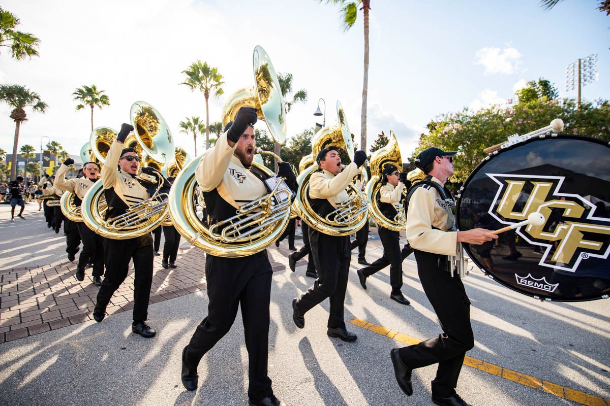 Sousaphone and a drum player perform the March to Victory before a game. 