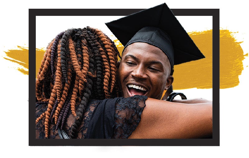 Image of a graduate hugging another person